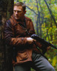 Daniel Craig Holding Firearms in Brown Leather Coat Photo Print - Item # VARCEL688724