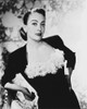 Joan Crawford leaning in a blouse Photo Print - Item # VARCEL688750