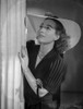 Joan Crawford wearing a V-Neck Blouse with Matching Hat in a Classic Portrait Photo Print - Item # VARCEL688784