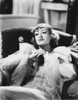 Joan Crawford lying on a sofa Photo Print - Item # VARCEL688778