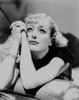Joan Crawford lying on a sofa Photo Print - Item # VARCEL688794