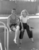 Joan Crawford sitting on the Diving Board with a Friend in Classic Photo Print - Item # VARCEL688799