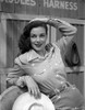 Marguerite Chapman Leaning in Casual Attire with a Smile Photo Print - Item # VARCEL696094