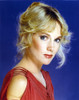 Julia Duffy wearing a Red Sleeveless Dress in a Close Up Portrait Photo Print - Item # VARCEL696246
