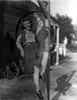 A Portrait Of Carolina Cotton in A Cowgirl Costume Photo Print - Item # VARCEL696427
