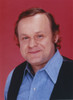 George Dzundza smiling Close Up Portrait Photo Print - Item # VARCEL696496
