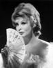 Arlene Dahl posed in Furry Dress with Fan Photo Print - Item # VARCEL696550