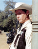 Larry Hagman smiling in Sheriff Uniform Holding a Pistol Photo Print - Item # VARCEL696553
