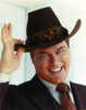 Larry Hagman smiling in Brown Coat Photo Print - Item # VARCEL696569