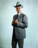 Larry Hagman Posed in Grey Coat with Cowboy Hat Photo Print - Item # VARCEL696577