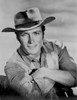 Clint Eastwood smiling in Cowboy Attire with Arm's Cross Photo Print - Item # VARCEL696584
