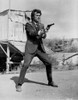 Clint Eastwood standing in Black Suit with Pistol Photo Print - Item # VARCEL696615