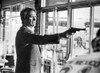 Clint Eastwood Pointing Pistol in Tuxedo Photo Print - Item # VARCEL696599