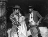 Bebe Daniels hugging the Man in Polka Dot Long Sleeve Shirt while Touching His Chest Photo Print - Item # VARCEL696657
