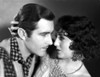 Bebe Daniels Ready to Kiss the Man in Polka Dot Collar Shirt while Holding His Head Photo Print - Item # VARCEL696642