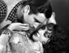 Bebe Daniels Resisting on a Man Trying to Kiss Her in White Dress Photo Print - Item # VARCEL696645