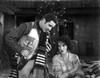 Bebe Daniels Listening to the Man in Polka Dot Sleeve Shirt while Seated in Knitted Dress Photo Print - Item # VARCEL696692