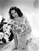 Linda Darnell sitting wearing Floral Dress in Black and White Photo Print - Item # VARCEL696828