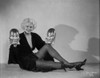 Jean Harlow Seated Holding Head Figures in Black Dress Photo Print - Item # VARCEL696821