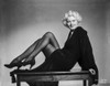 Jean Harlow Reclining on the Table in Black Long Sleeve Dress Photo Print - Item # VARCEL696920