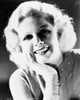 Jean Harlow Portrait in Grey Tight Long Sleeve Linen Dress with Head Leaning on the Right Hand Photo Print - Item # VARCEL697025