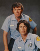 Emergency Portrait in Police Uniform And Black Background Photo Print - Item # VARCEL697035