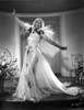 Marion Davies posed in Feather Dress in Black and White Photo Print - Item # VARCEL697071