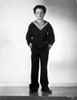 Freddie Bartholomew Leaning on Chair White Graduation Cap Photo Print - Item # VARCEL697059