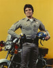 Erik Estrada Holding Helmet in Police Uniform Photo Print - Item # VARCEL697086