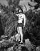 Joan Davis posed While Pointing A Gun in Black and White Photo Print - Item # VARCEL697141