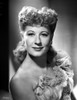 Joan Davis Showing a Little Smile while Looking at the Camera Photo Print - Item # VARCEL697174