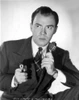 A Portrait Of John Beal Carrying A Gun Photo Print
