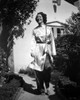 Joan Davis Walking in Silk Coat in Black and White Photo Print - Item # VARCEL697171