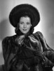 Frances Dee posed in Fur Dress in Black and White Photo Print - Item # VARCEL697381
