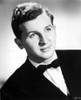 Eddie Bracken Posed in Black Suit With Black Background Photo Print - Item # VARCEL697438