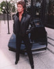 David Hasselhoff standing in Black Leather Jacket with Black Pants and Black Shoes Photo Print - Item # VARCEL697487