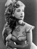 Gloria DeHaven posed On A Pole in Fancy Dress in Black and White Photo Print - Item # VARCEL697532