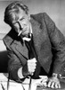 Lloyd Bridges leaning on a desk Photo Print - Item # VARCEL697519
