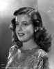 Gloria DeHaven Side View Posed with Red lipstick and Curly Hair Photo Print - Item # VARCEL697544