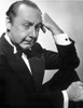 Franklin Pangborn Posed in Black Suit With Head Leaning on Hand Photo Print - Item # VARCEL697682
