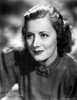 Irene Dunne on Blouse sitting Portrait Photo Print - Item # VARCEL697922
