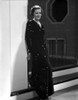 Irene Dunne on Black Long Dress Leaning on Wall Photo Print - Item # VARCEL697978