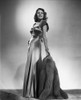 Rita Hayworth Posed in a Shiny Gown Photo Print - Item # VARCEL698028