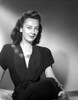 Ann Dvorak on Dark Dress and sitting Portrait Photo Print - Item # VARCEL698079
