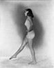Rita Hayworth Posed with a Sexy White Dress Photo Print - Item # VARCEL698071