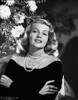 Rita Hayworth Posed in a Black Gown with Arms Crossed Photo Print - Item # VARCEL698095