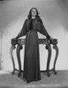 Rita Hayworth Leaning on Table in Black Gown Photo Print - Item # VARCEL698141
