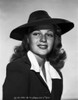 Rita Hayworth Posed with a Black Hat Photo Print - Item # VARCEL698207