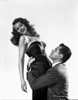 Rita Hayworth Held by a Man in Suit Photo Print - Item # VARCEL698239