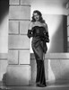 Rita Hayworth Leaning on Wall in Black Dress Photo Print - Item # VARCEL698251